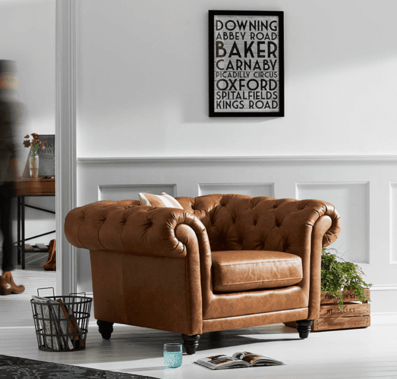 A Pottery Barn Chesterfield Leather Armchair Dupe You’ll Need To Sit Down For